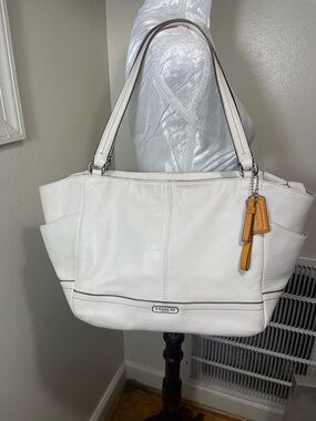 Coach White pebbled shoulder Leather Tote with Tan Accent Charm